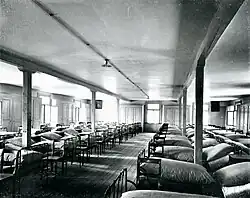 Schlafsaal für italienische Hilfsarbeiterinnen.