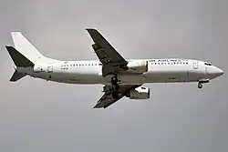 Boeing 737 (YI-AQS) der UR Airlines im Flug