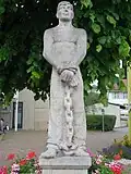 Uli Schad Brunnen in Oberdorf, Baselland, Schweiz. Geschaffen von Fritz Bürgin.