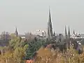 Blick Richtung Innenstadt (von links): Peterkirche, ehemaliges NWZ-Hochhaus, Lambertikirche, Garnisonkirche, Finanzamt