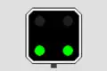zwei grüne Lichter waagrecht nebeneinander