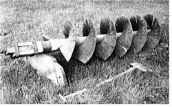 Hölzerne archimedische Schraube eines windbetriebenen Schöpfwerks