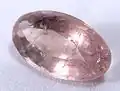 Rosa Zektzerit im ovalen Facettenschliff